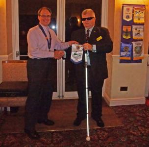Presentation of Lions Bannerette to Nigel Whiteley of St Dunstans