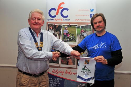 Presentation of bannerette to Matthew Shaw, manager of The Charity Bike Shop, Ditchling