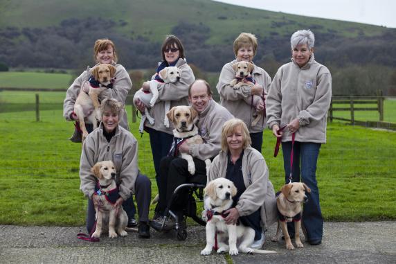 Allen Parton and EJ with 6 more young dogs to be trained
