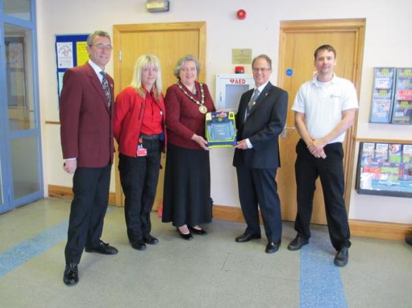 Presentation of Defibrillator to Chair of Mid Sussex and The Martlets Manager